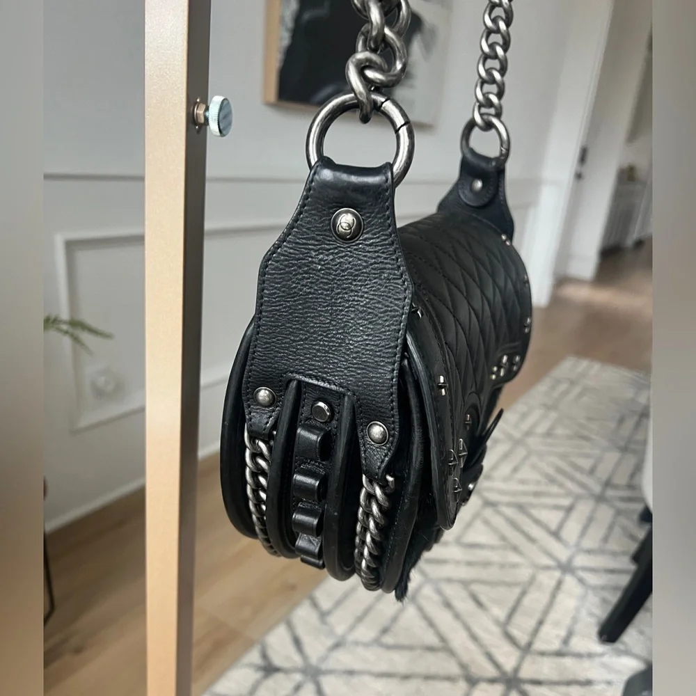 CHANEL Black Quilted & Fur Star-Studded Saddle Bag